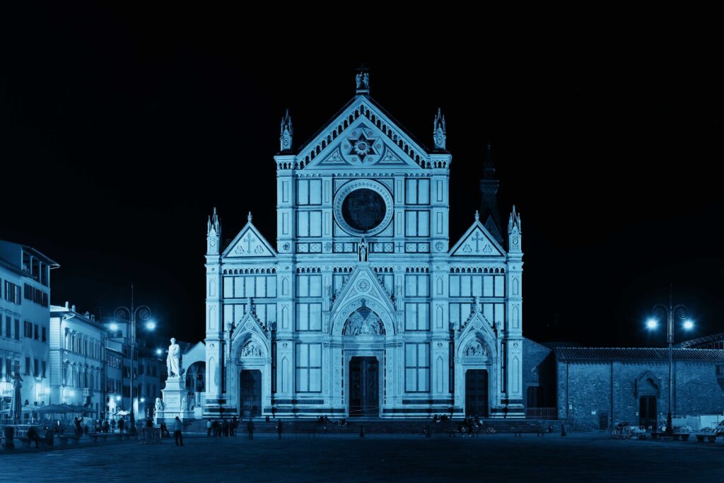 A large building with a clock on the front of it.