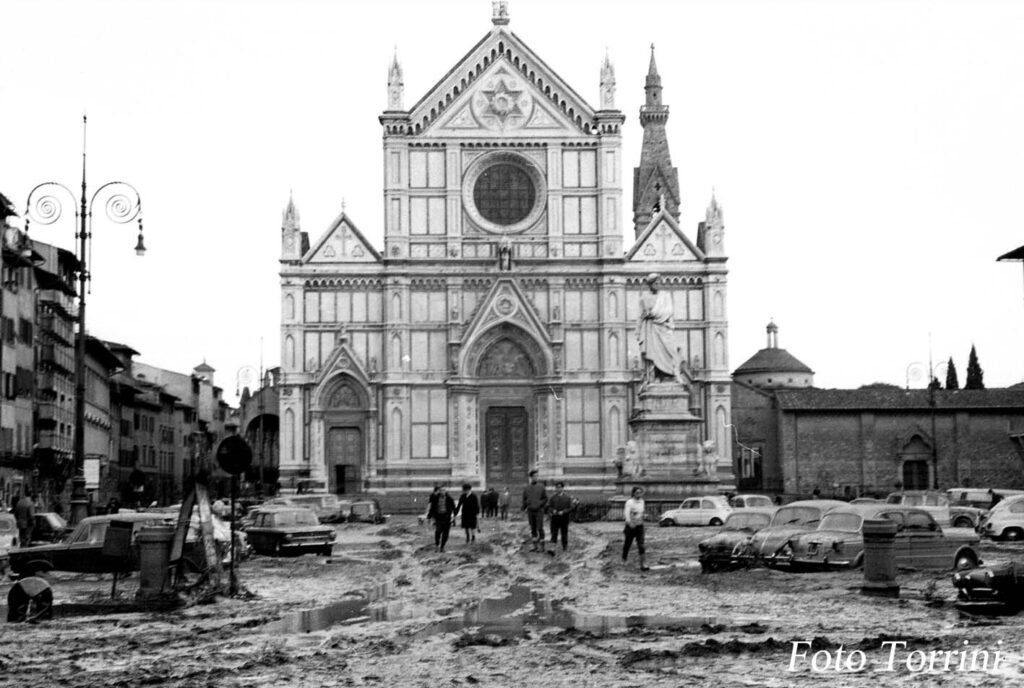 A black and white photo of an old church